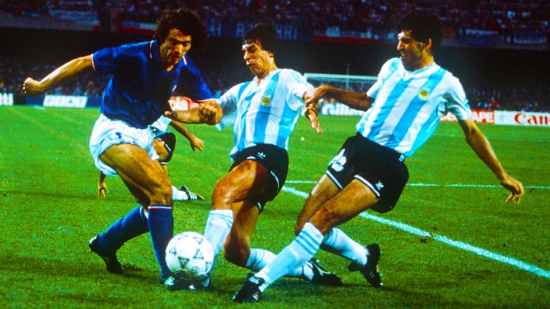 1990-World-Cup-Semi-Final-Naples-Italy-Roberto-Donadoni-is-challenged-for-the-ball-by-Argentinas-Juan-Ernesto-Simon-and-Jose-Basualdo-Photo-by-Bob-ThomasGetty-Images